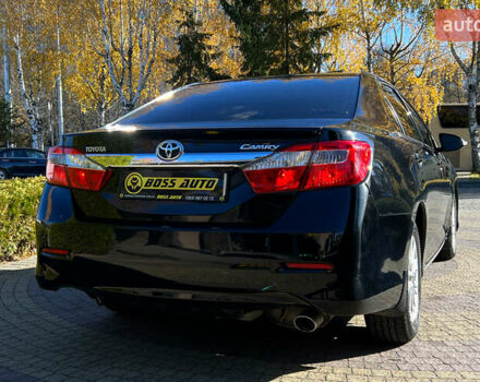 Черный Тойота Камри, объемом двигателя 2.49 л и пробегом 260 тыс. км за 13750 $, фото 6 на Automoto.ua