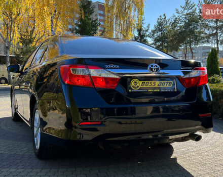 Черный Тойота Камри, объемом двигателя 2.49 л и пробегом 260 тыс. км за 13750 $, фото 4 на Automoto.ua