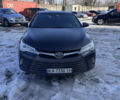 Черный Тойота Камри, объемом двигателя 2.49 л и пробегом 240 тыс. км за 11000 $, фото 1 на Automoto.ua