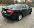 Черный Тойота Камри, объемом двигателя 2.5 л и пробегом 140 тыс. км за 10900 $, фото 1 на Automoto.ua