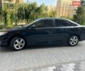 Черный Тойота Камри, объемом двигателя 2.49 л и пробегом 258 тыс. км за 10700 $, фото 1 на Automoto.ua