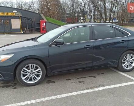 Чорний Тойота Камрі, об'ємом двигуна 2.49 л та пробігом 195 тис. км за 12100 $, фото 1 на Automoto.ua