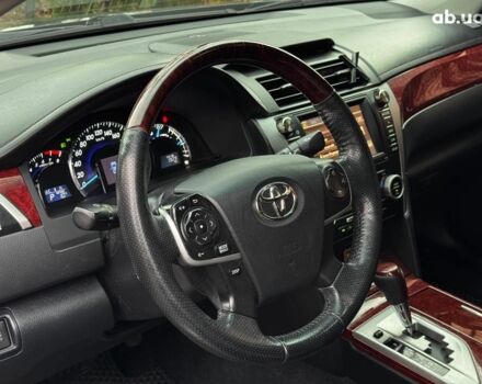 Черный Тойота Камри, объемом двигателя 2.5 л и пробегом 257 тыс. км за 13990 $, фото 18 на Automoto.ua