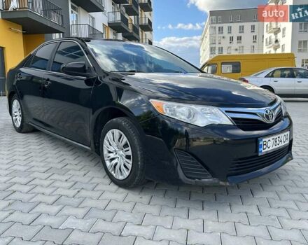 Черный Тойота Камри, объемом двигателя 2.49 л и пробегом 195 тыс. км за 11250 $, фото 7 на Automoto.ua