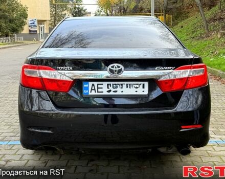 Черный Тойота Камри, объемом двигателя 2.5 л и пробегом 208 тыс. км за 9500 $, фото 4 на Automoto.ua