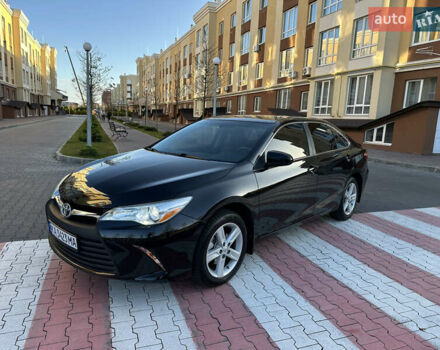 Черный Тойота Камри, объемом двигателя 2.49 л и пробегом 97 тыс. км за 12800 $, фото 1 на Automoto.ua