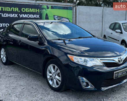 Черный Тойота Камри, объемом двигателя 2.5 л и пробегом 171 тыс. км за 12500 $, фото 2 на Automoto.ua