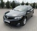 Черный Тойота Камри, объемом двигателя 2.5 л и пробегом 220 тыс. км за 11900 $, фото 1 на Automoto.ua