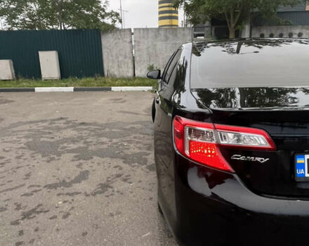 Черный Тойота Камри, объемом двигателя 2.5 л и пробегом 240 тыс. км за 14000 $, фото 13 на Automoto.ua