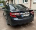 Черный Тойота Камри, объемом двигателя 2.5 л и пробегом 211 тыс. км за 12000 $, фото 8 на Automoto.ua