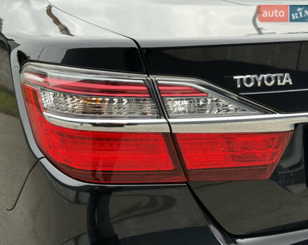 Черный Тойота Камри, объемом двигателя 2.5 л и пробегом 153 тыс. км за 16700 $, фото 18 на Automoto.ua