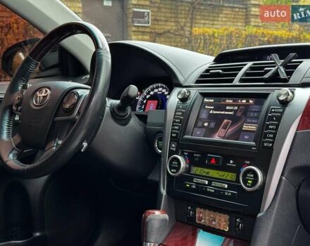 Черный Тойота Камри, объемом двигателя 2.5 л и пробегом 257 тыс. км за 13990 $, фото 35 на Automoto.ua