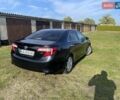 Черный Тойота Камри, объемом двигателя 2.5 л и пробегом 130 тыс. км за 11500 $, фото 1 на Automoto.ua