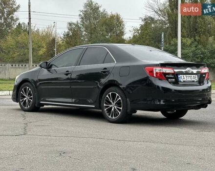 Черный Тойота Камри, объемом двигателя 2.49 л и пробегом 220 тыс. км за 12800 $, фото 6 на Automoto.ua