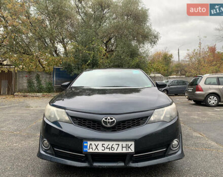 Черный Тойота Камри, объемом двигателя 2.49 л и пробегом 198 тыс. км за 11300 $, фото 4 на Automoto.ua