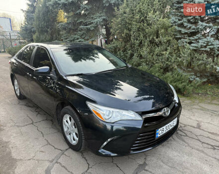 Черный Тойота Камри, объемом двигателя 2.5 л и пробегом 200 тыс. км за 12200 $, фото 1 на Automoto.ua