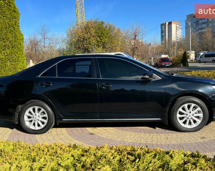 Черный Тойота Камри, объемом двигателя 2.49 л и пробегом 260 тыс. км за 13750 $, фото 7 на Automoto.ua