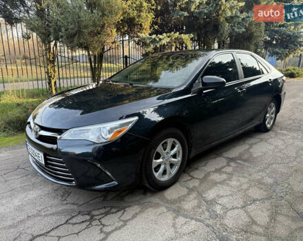 Черный Тойота Камри, объемом двигателя 2.5 л и пробегом 200 тыс. км за 12200 $, фото 2 на Automoto.ua