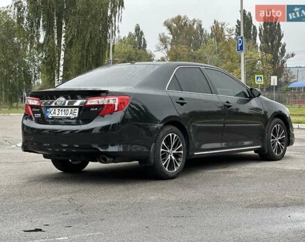 Черный Тойота Камри, объемом двигателя 2.49 л и пробегом 220 тыс. км за 12800 $, фото 4 на Automoto.ua