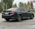Черный Тойота Камри, объемом двигателя 2.49 л и пробегом 220 тыс. км за 12800 $, фото 4 на Automoto.ua