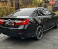 Черный Тойота Камри, объемом двигателя 2.5 л и пробегом 257 тыс. км за 13990 $, фото 8 на Automoto.ua