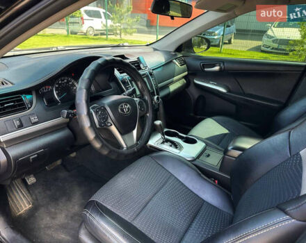 Черный Тойота Камри, объемом двигателя 2.5 л и пробегом 202 тыс. км за 13000 $, фото 5 на Automoto.ua
