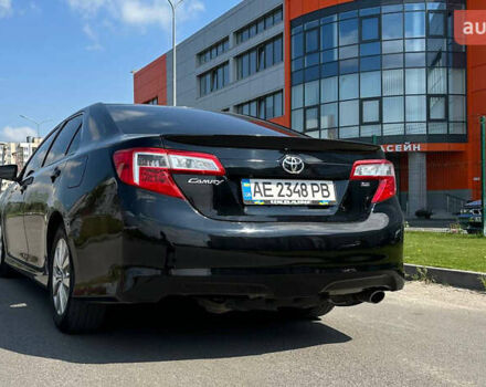 Черный Тойота Камри, объемом двигателя 2.5 л и пробегом 202 тыс. км за 13000 $, фото 1 на Automoto.ua