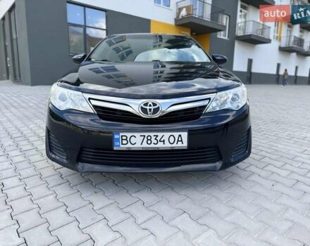 Черный Тойота Камри, объемом двигателя 2.49 л и пробегом 195 тыс. км за 11250 $, фото 1 на Automoto.ua