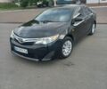Черный Тойота Камри, объемом двигателя 2.5 л и пробегом 200 тыс. км за 11400 $, фото 1 на Automoto.ua