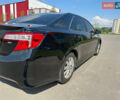Черный Тойота Камри, объемом двигателя 2.5 л и пробегом 202 тыс. км за 13000 $, фото 7 на Automoto.ua