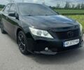 Черный Тойота Камри, объемом двигателя 2.49 л и пробегом 193 тыс. км за 15300 $, фото 1 на Automoto.ua