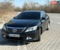 Чорний Тойота Камрі, об'ємом двигуна 2.5 л та пробігом 328 тис. км за 14300 $, фото 1 на Automoto.ua