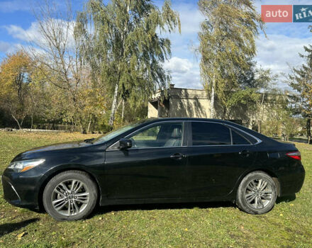 Чорний Тойота Камрі, об'ємом двигуна 2.49 л та пробігом 250 тис. км за 14500 $, фото 7 на Automoto.ua