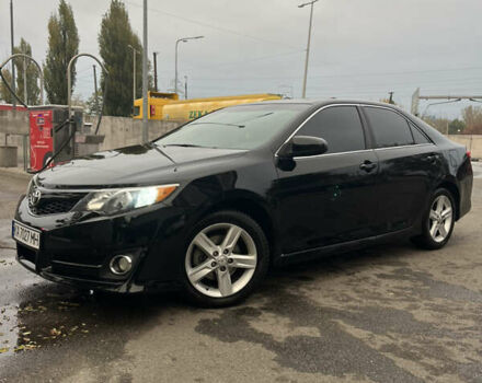 Черный Тойота Камри, объемом двигателя 2.5 л и пробегом 240 тыс. км за 14000 $, фото 1 на Automoto.ua