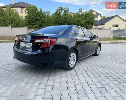 Черный Тойота Камри, объемом двигателя 2.49 л и пробегом 195 тыс. км за 11250 $, фото 6 на Automoto.ua