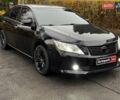 Черный Тойота Камри, объемом двигателя 2.5 л и пробегом 257 тыс. км за 13990 $, фото 2 на Automoto.ua