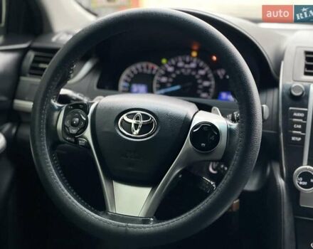 Черный Тойота Камри, объемом двигателя 2.49 л и пробегом 210 тыс. км за 12300 $, фото 13 на Automoto.ua