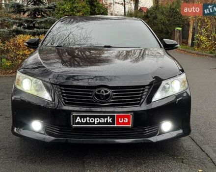 Черный Тойота Камри, объемом двигателя 2.5 л и пробегом 257 тыс. км за 13990 $, фото 1 на Automoto.ua