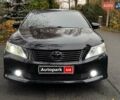 Черный Тойота Камри, объемом двигателя 2.5 л и пробегом 257 тыс. км за 13990 $, фото 1 на Automoto.ua