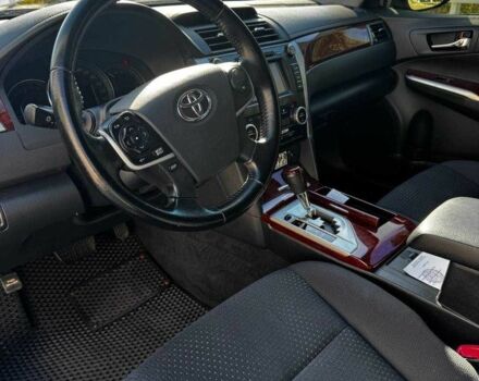 Черный Тойота Камри, объемом двигателя 2.5 л и пробегом 128 тыс. км за 15000 $, фото 1 на Automoto.ua