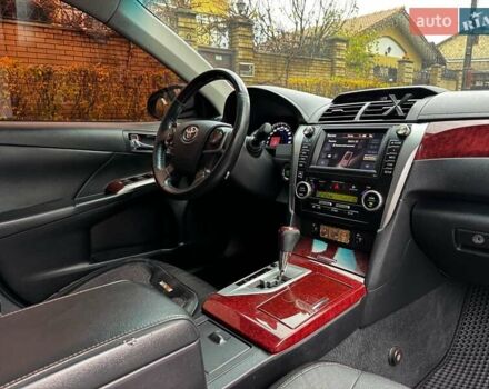 Черный Тойота Камри, объемом двигателя 2.5 л и пробегом 257 тыс. км за 13990 $, фото 34 на Automoto.ua