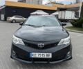 Черный Тойота Камри, объемом двигателя 2.5 л и пробегом 260 тыс. км за 9800 $, фото 1 на Automoto.ua