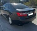 Черный Тойота Камри, объемом двигателя 2.5 л и пробегом 128 тыс. км за 15000 $, фото 3 на Automoto.ua