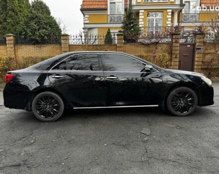Черный Тойота Камри, объемом двигателя 2.5 л и пробегом 257 тыс. км за 13990 $, фото 7 на Automoto.ua