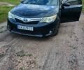 Черный Тойота Камри, объемом двигателя 2.5 л и пробегом 211 тыс. км за 12000 $, фото 1 на Automoto.ua