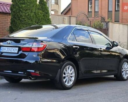 Черный Тойота Камри, объемом двигателя 2.49 л и пробегом 73 тыс. км за 18900 $, фото 1 на Automoto.ua