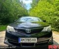 Черный Тойота Камри, объемом двигателя 2.5 л и пробегом 180 тыс. км за 12400 $, фото 1 на Automoto.ua