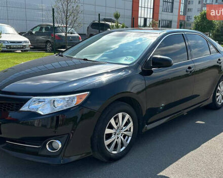 Черный Тойота Камри, объемом двигателя 2.5 л и пробегом 202 тыс. км за 13000 $, фото 2 на Automoto.ua