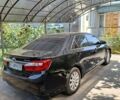 Чорний Тойота Камрі, об'ємом двигуна 2.49 л та пробігом 250 тис. км за 13200 $, фото 1 на Automoto.ua