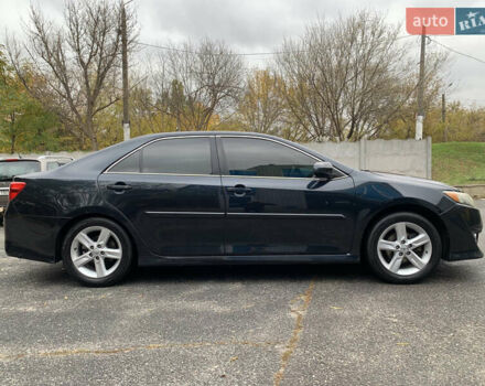 Черный Тойота Камри, объемом двигателя 2.49 л и пробегом 198 тыс. км за 11300 $, фото 3 на Automoto.ua